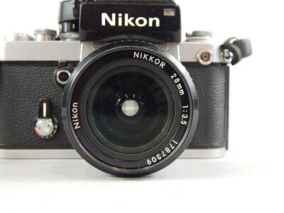 A Nikon camera with Nikkor 28mm lens. - 2