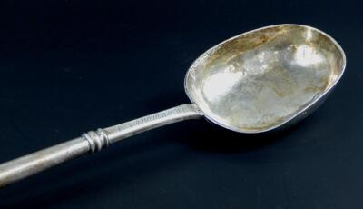 A George I silver canon handled basting spoon