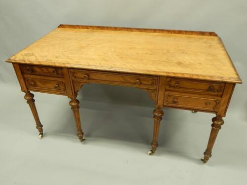 A Victorian satin birch dressing table by W. Bertram of London