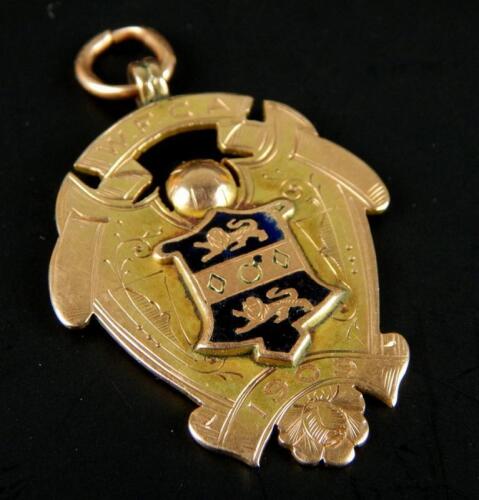 A 9ct gold crest fob