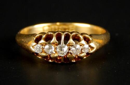 An 18ct gold five stone diamond ring