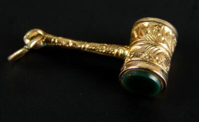 A gavel shaped charm