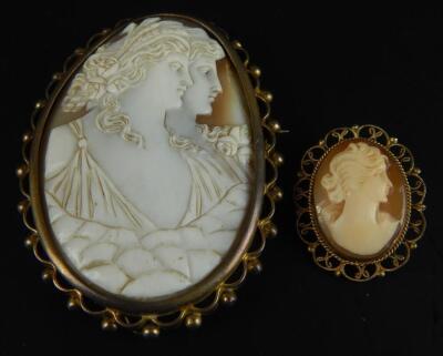 Two wire framed cameo brooches.