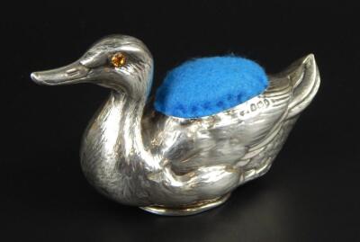 An Edwardian silver pin cushion