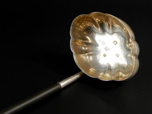 An Elizabeth II silver toddy ladle with twisted handle