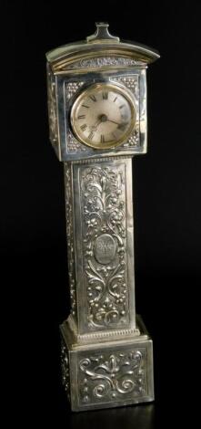 A Victorian silver and oak miniature longcase clock