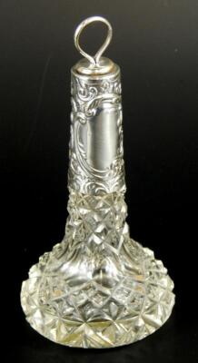 An Edwardian cut glass and silver mounted scent bottle