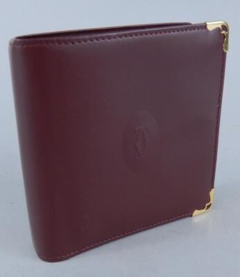 A Cartier gentleman's brown leather wallet