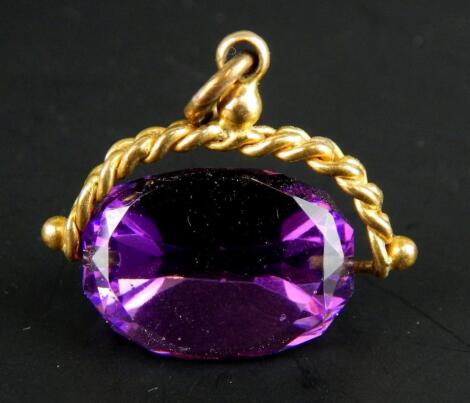 A swivel amethyst fob