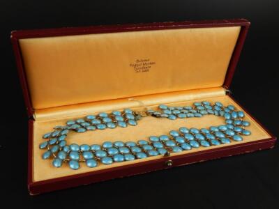 A blue enamel necklace