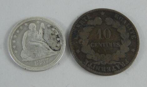 An 1857 USA silver quarter and an 1872 French 10 centimes coin