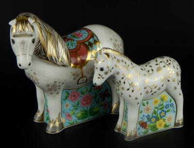 Two Royal Crown Derby Shetland pony and foal paperweights