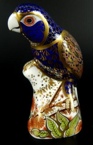 A Royal Crown Derby bronze winged parrot paperweight