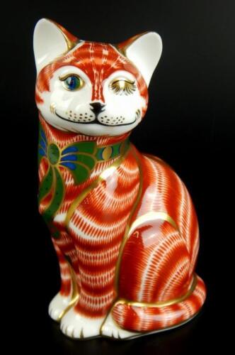 A Royal Crown Derby Cheshire cat paperweight