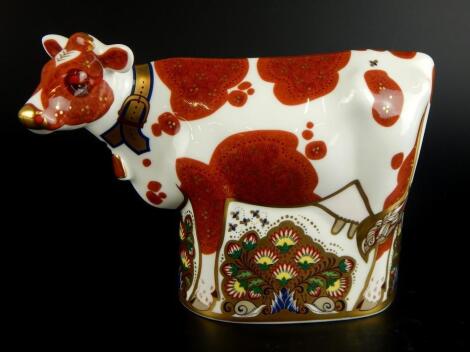 A Royal Crown Derby daisy cow paperweight