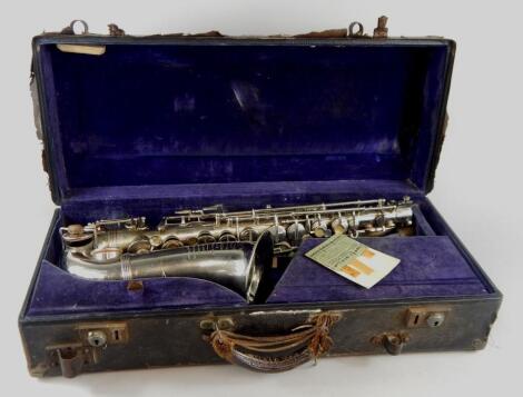 A Jerome Tibouville Lamy Parisien silver plated saxophone