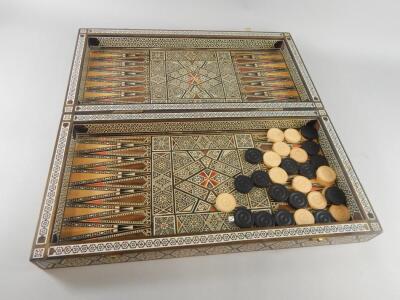 A late 20thC Damascus type mother of pearl and bone inlaid backgammon box - 2