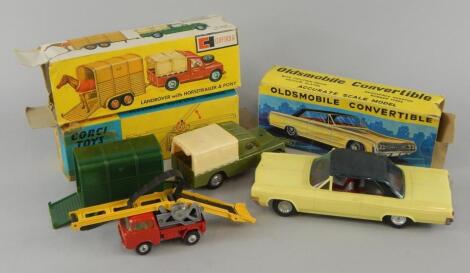 Three die-cast vehicles