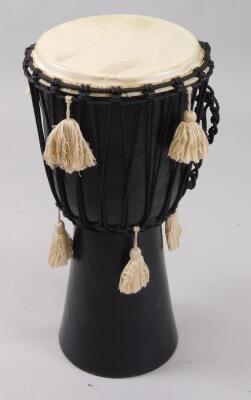 A ceramic and leather drum