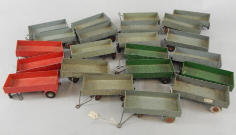 A quantity of diecast toy agricultural trailers