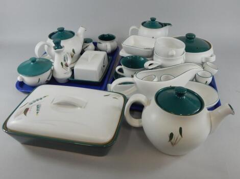 A quantity of Denby Greenwheat pattern dinner and teaware