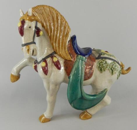 A reproduction coloured pottery Chinese tang type horse