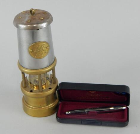 A reproduction brass Welsh miner's lamp