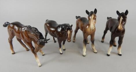 Three large Beswick models of brown foals