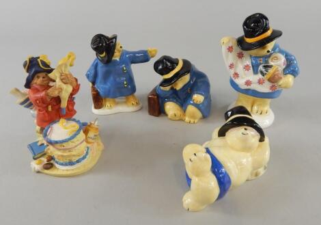 Five Paddington bear figures