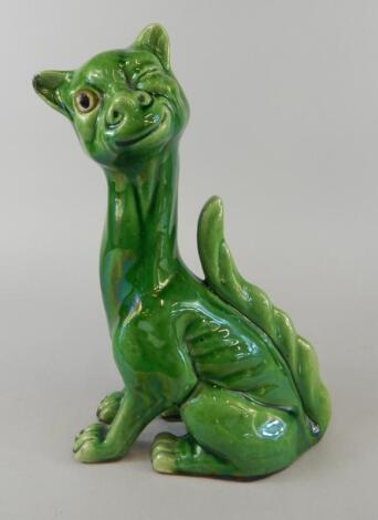 A Watcombe pottery grotesque looking winking cat