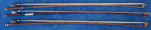 Three violin bows