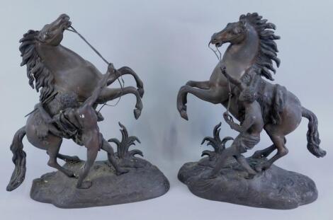 A pair of gilt bronze Marley horses