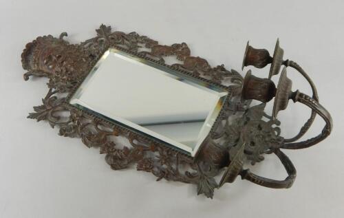 An early 20thC cast metal mirror