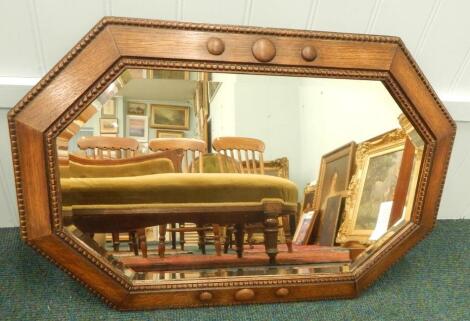 A 1930's oak mirror