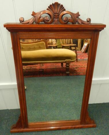 An Edwardian walnut framed dressing mirror