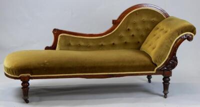 A late Victorian walnut framed chaise longue