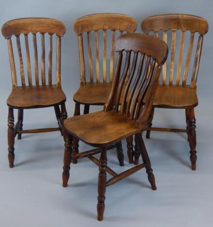 An associated set of four ash and elm lathe back kitchen chairs