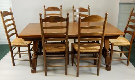 A reproduction oak refectory type dining table