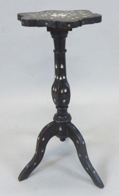An ebonised and mother of pearl finish occasional table