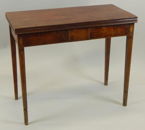 An early 19thC mahogany tea table
