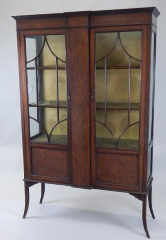 An Edwardian mahogany and boxwood strung display cabinet