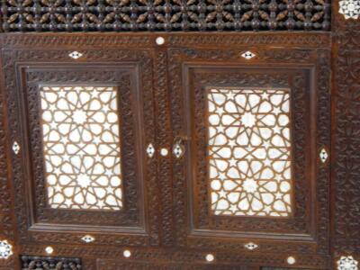 A late 19thC Middle Eastern hardwood and mother of pearl finish free standing corner cabinet - 2