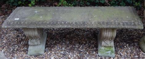 A modern reconstituted garden seat