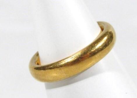 A 22ct gold plain wedding band