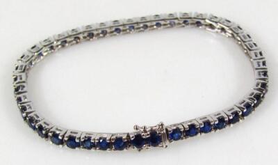 A sapphire set tennis bracelet