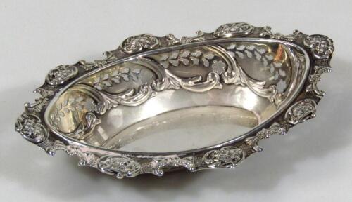 An Edwardian oval silver basket