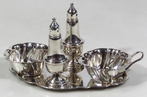 A collection of silver and plate