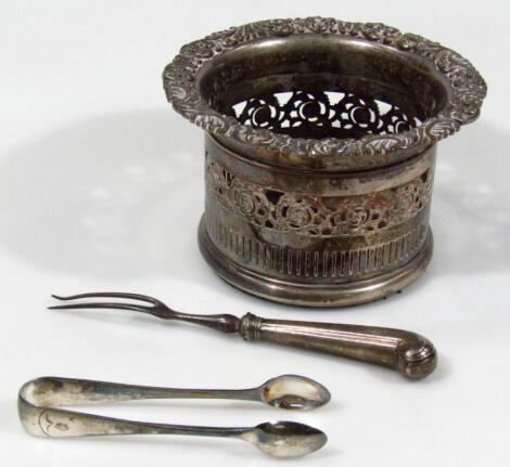 A late 19thC silver plated bottle coaster