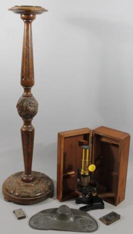 An early 20thC mahogany cased student's microscope