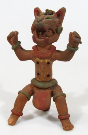 An Inca unglazed pottery figure of a standing Inca god